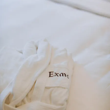 Exmo By Olivia Oporto